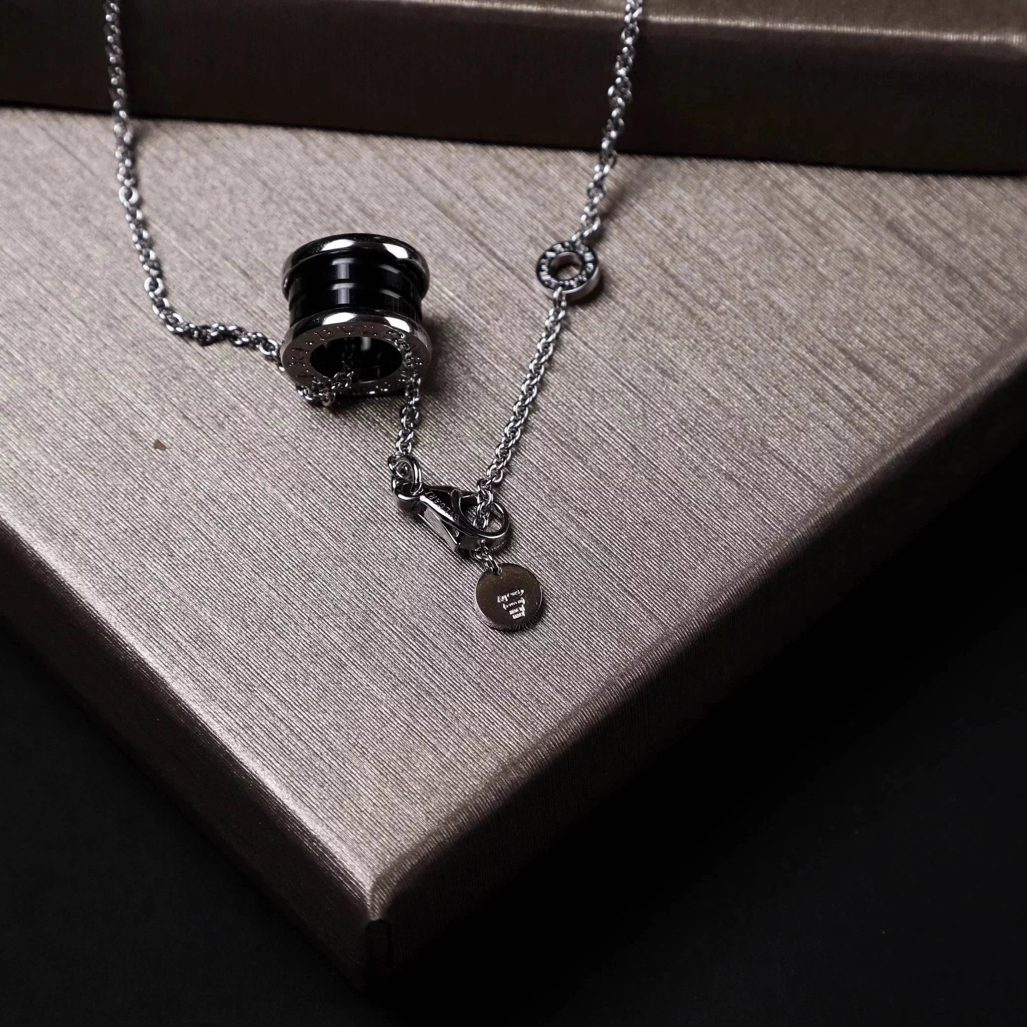 Item ID 8372 Baoge -BGR- Takaraya - Charity Little Red Man Black Ceramic Pendant S9