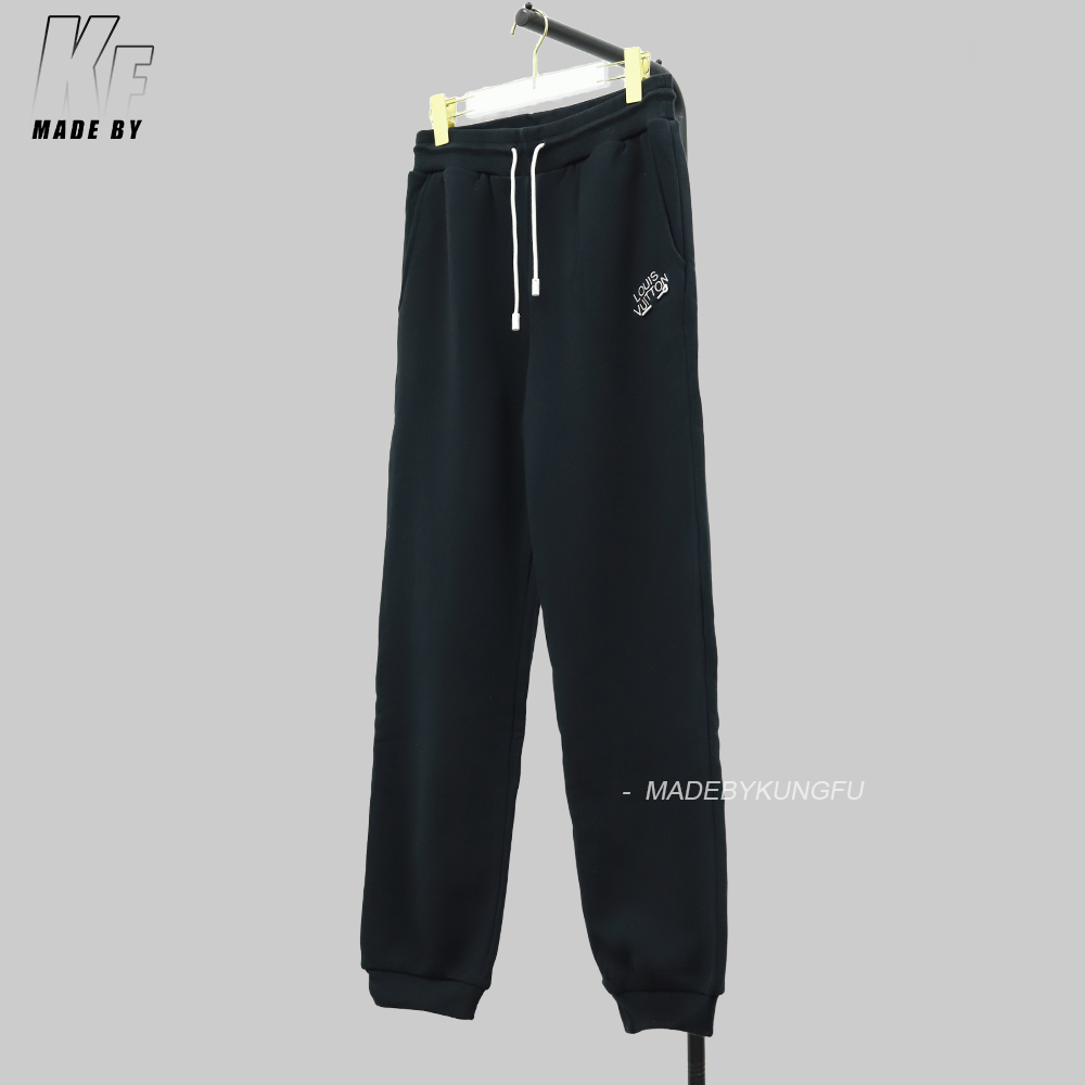 LV pin and velvet sweatpants