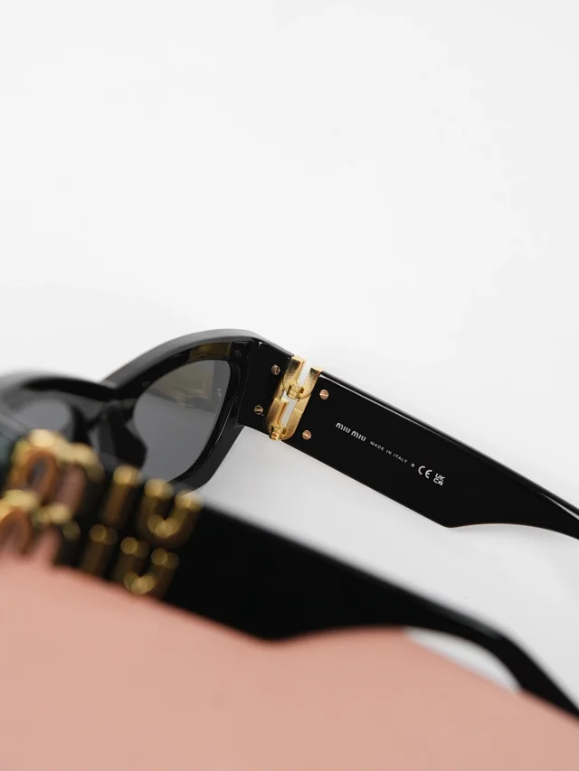 Item ID 9073 M1U Exclusive Hardware Accessory with letter carving, irregular shaped temple, black sunglasses, available in prescription