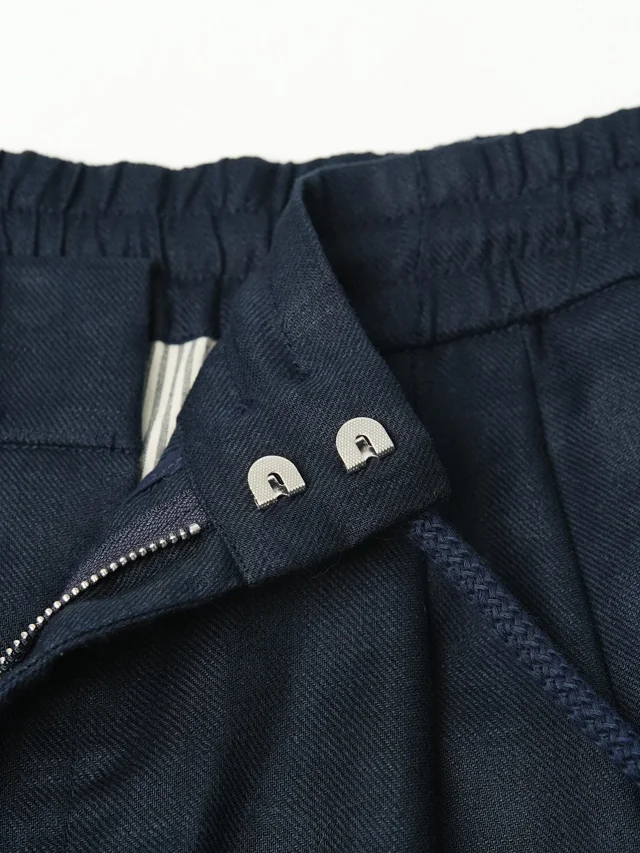 Item ID 9079 BC natural linen rolled edge shorts with double pleat design, drawstring, elastic waistband, and pleated casual shorts