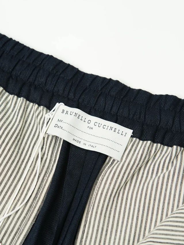 Item ID 9079 BC natural linen rolled edge shorts with double pleat design, drawstring, elastic waistband, and pleated casual shorts