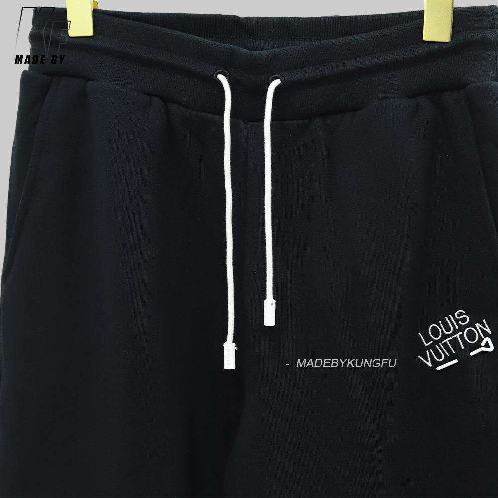 LV pin and velvet sweatpants