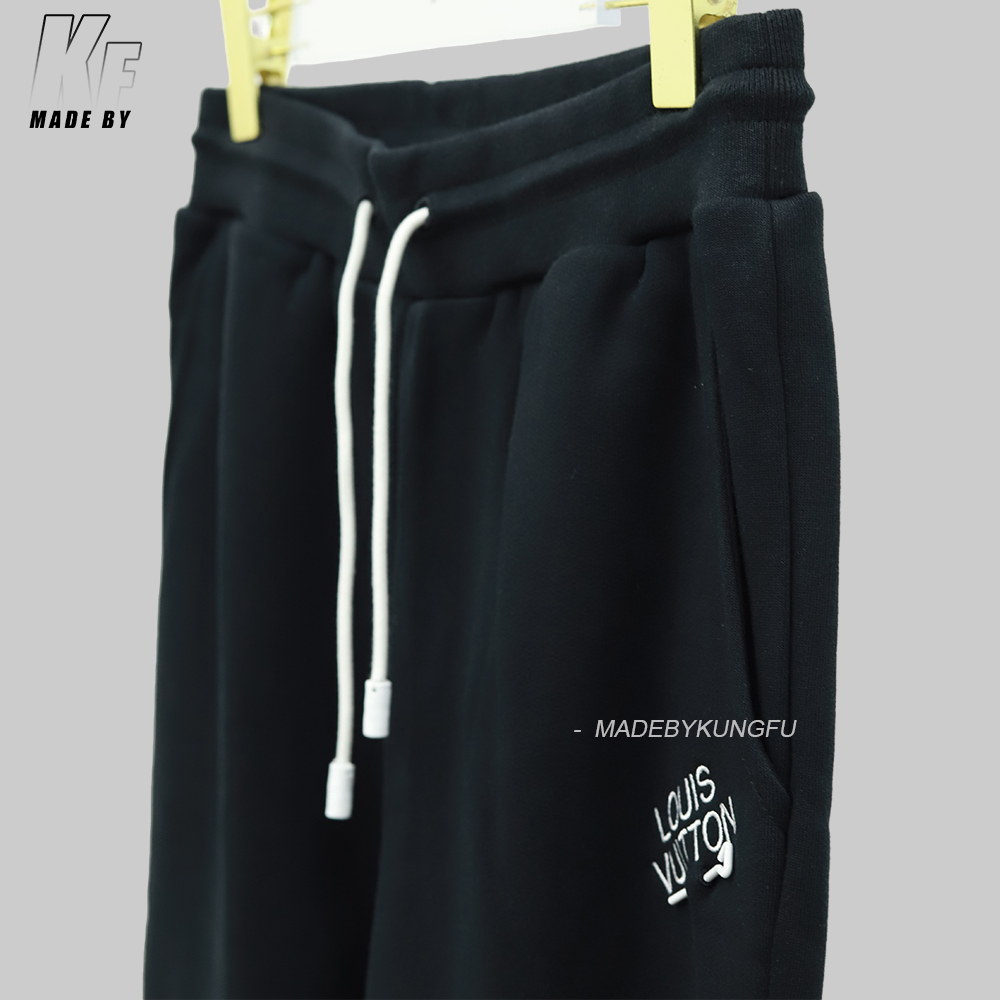 LV pin and velvet sweatpants