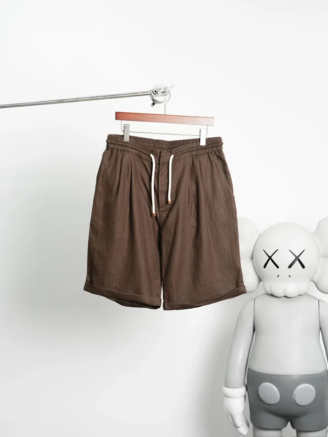 Item ID 9079 BC natural linen rolled edge shorts with double pleat design, drawstring, elastic waistband, and pleated casual shorts