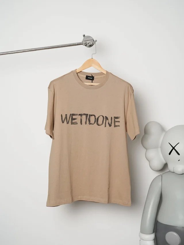 Item ID 9087 WE11DONE SS26 Imported Adhesive Material Fun Hand drawn Logo Soft Short sleeved T-shirt