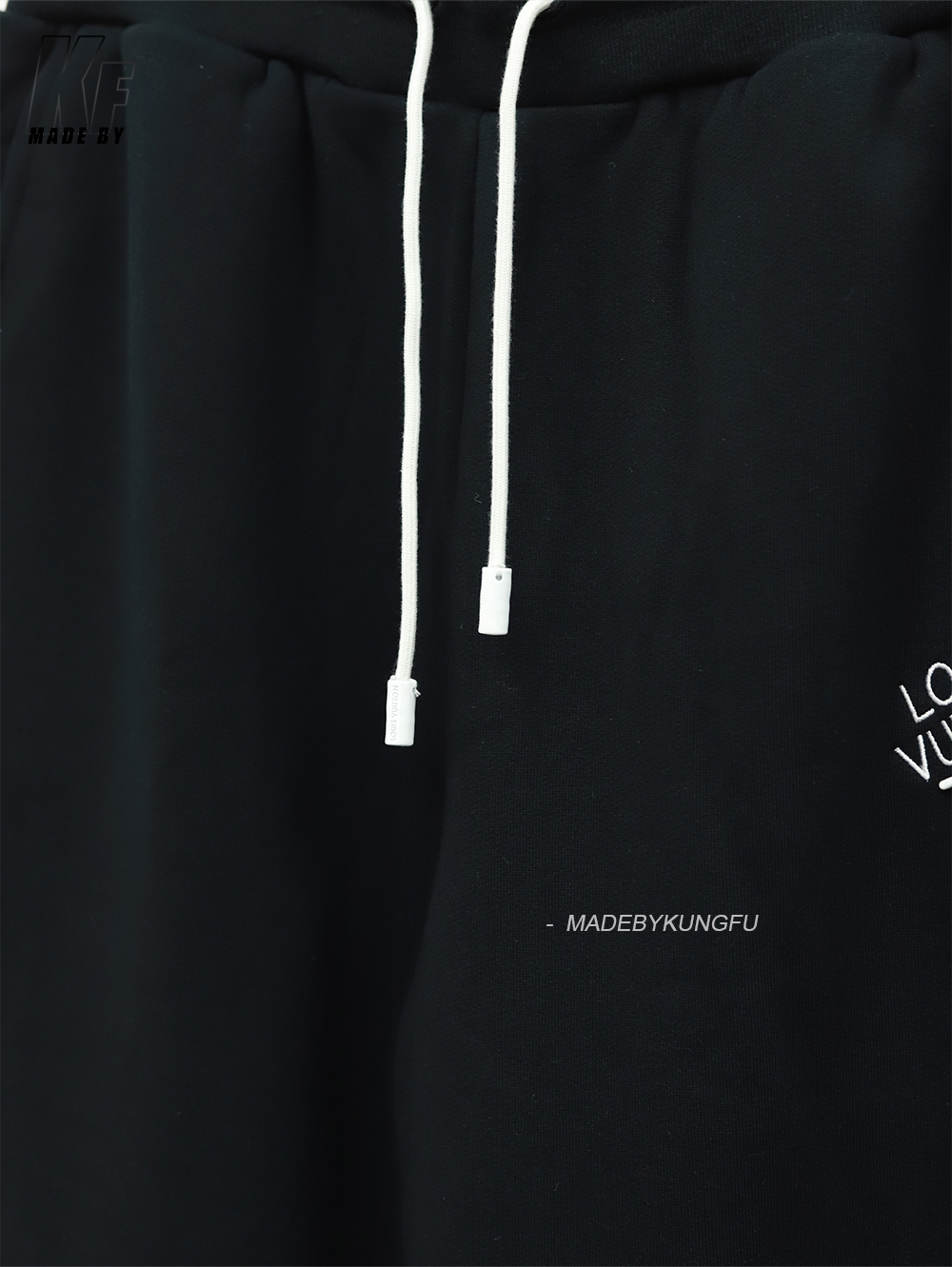 LV pin and velvet sweatpants