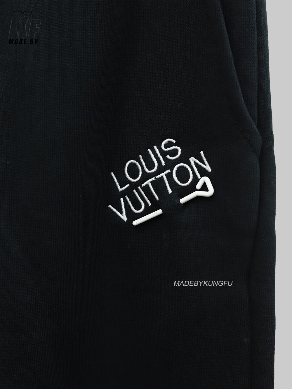 LV pin and velvet sweatpants