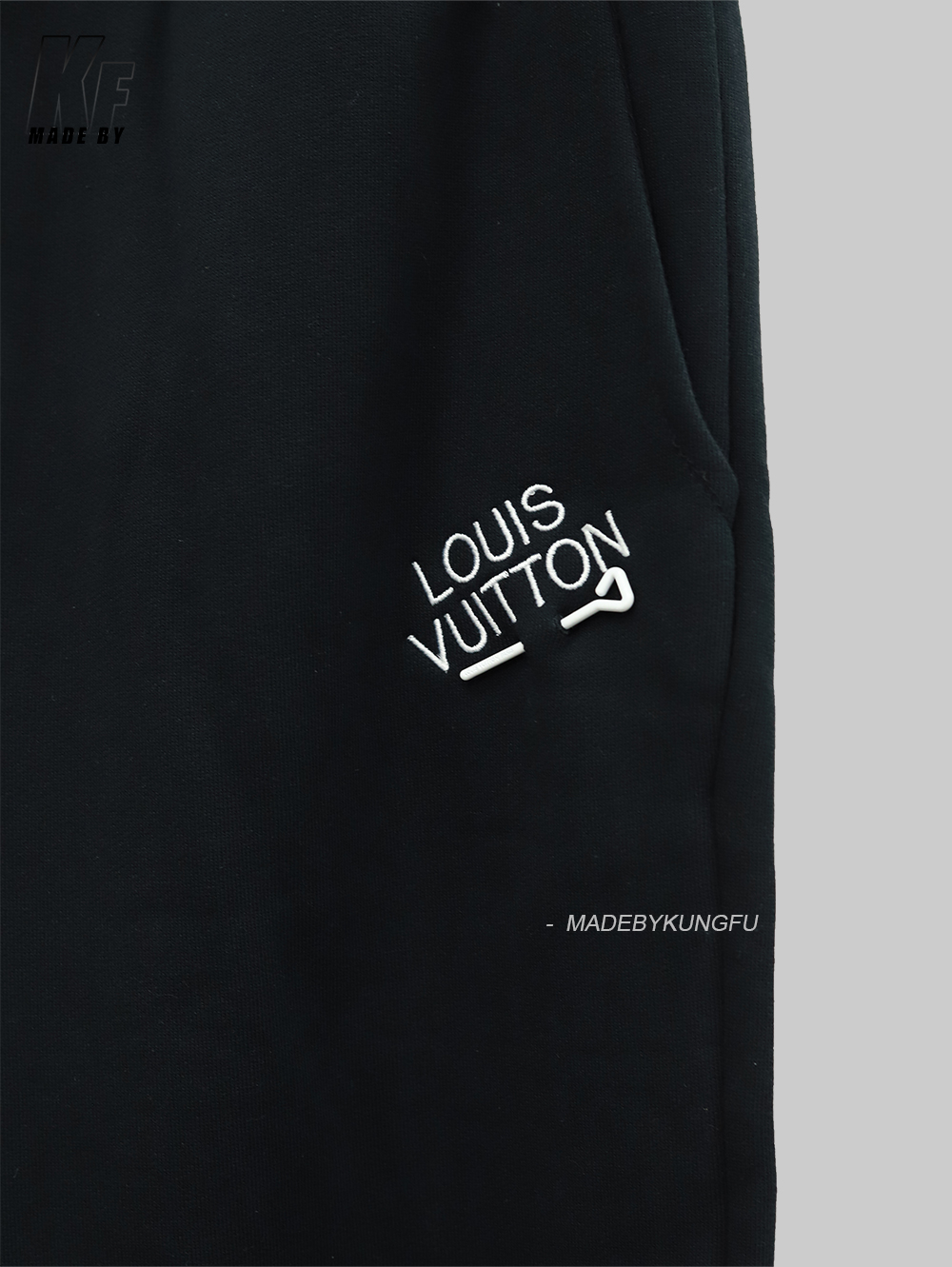 LV pin and velvet sweatpants