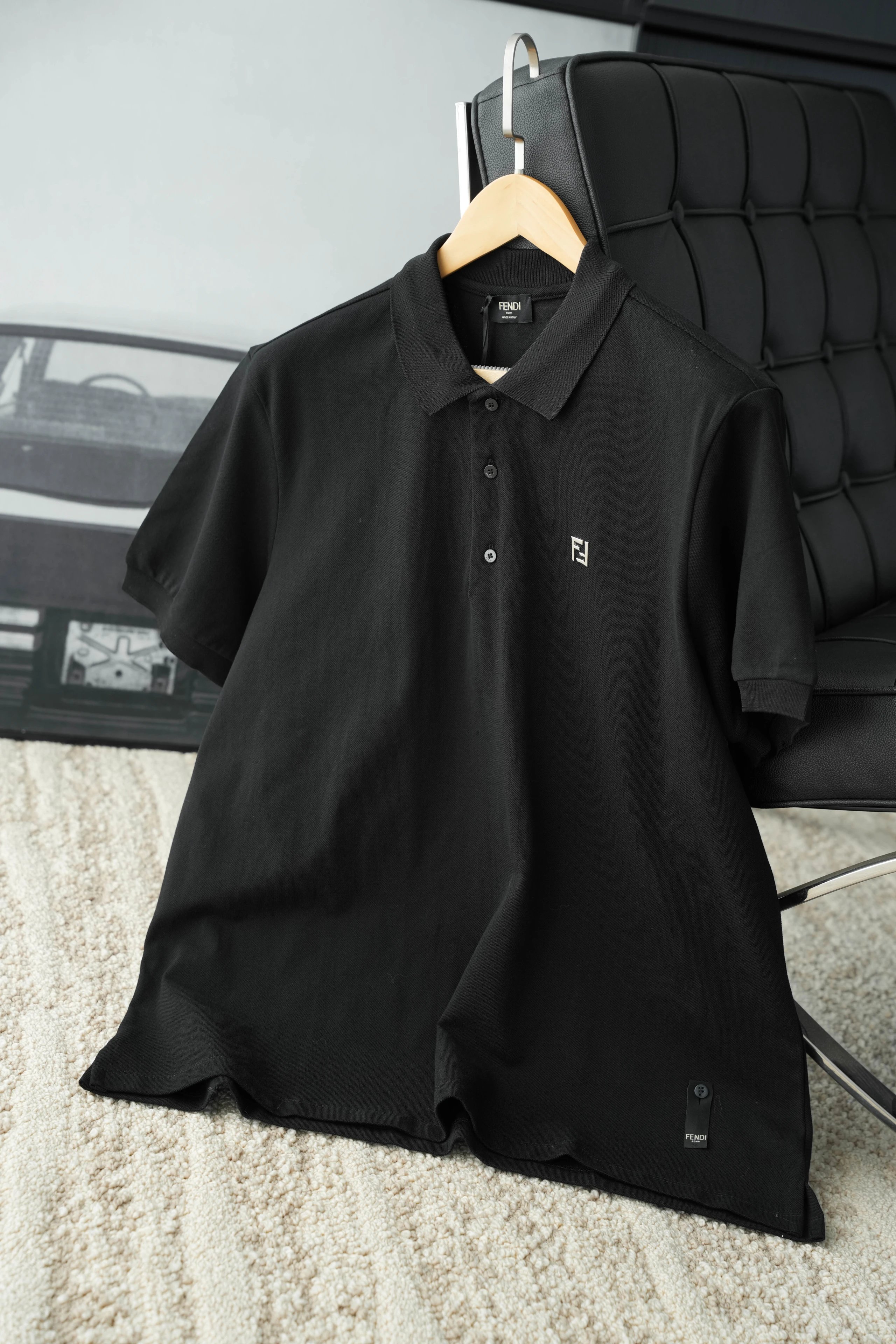 Item ID 8310 FEND1 Fendi -“ Frame craftsmanship ” Metal FF Buttoned embossed short