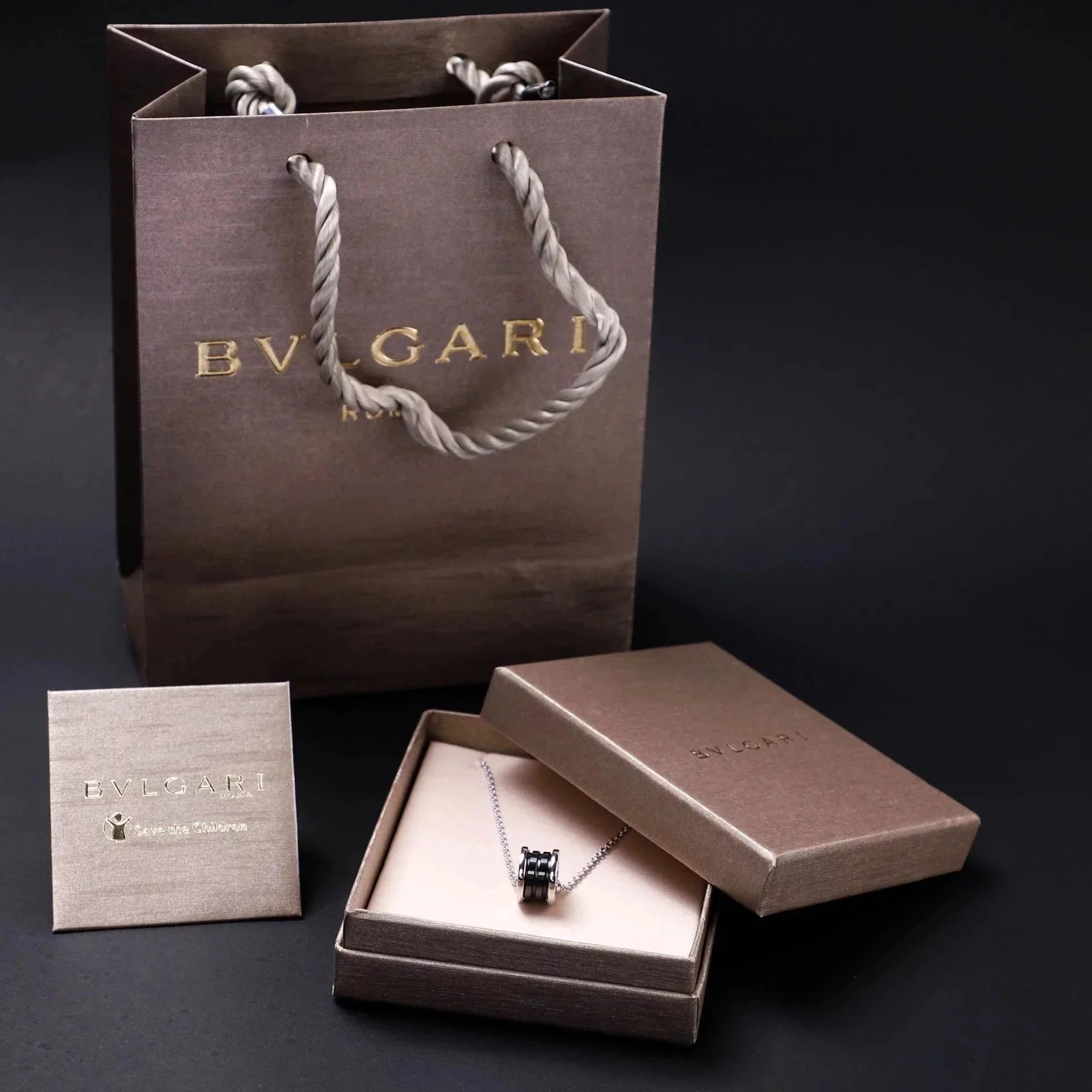 Item ID 8372 Baoge -BGR- Takaraya - Charity Little Red Man Black Ceramic Pendant S9