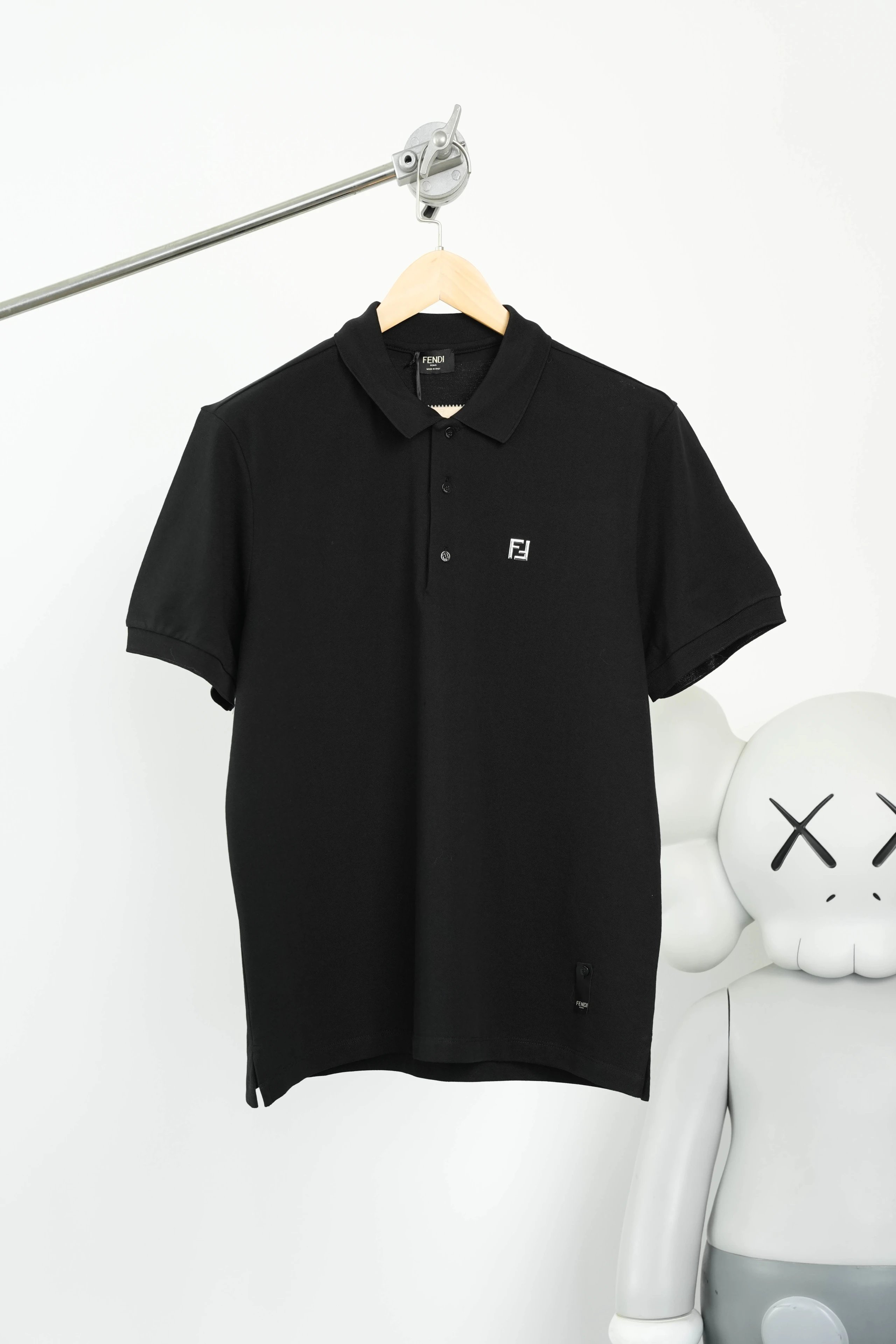 Item ID 8310 FEND1 Fendi -“ Frame craftsmanship ” Metal FF Buttoned embossed short