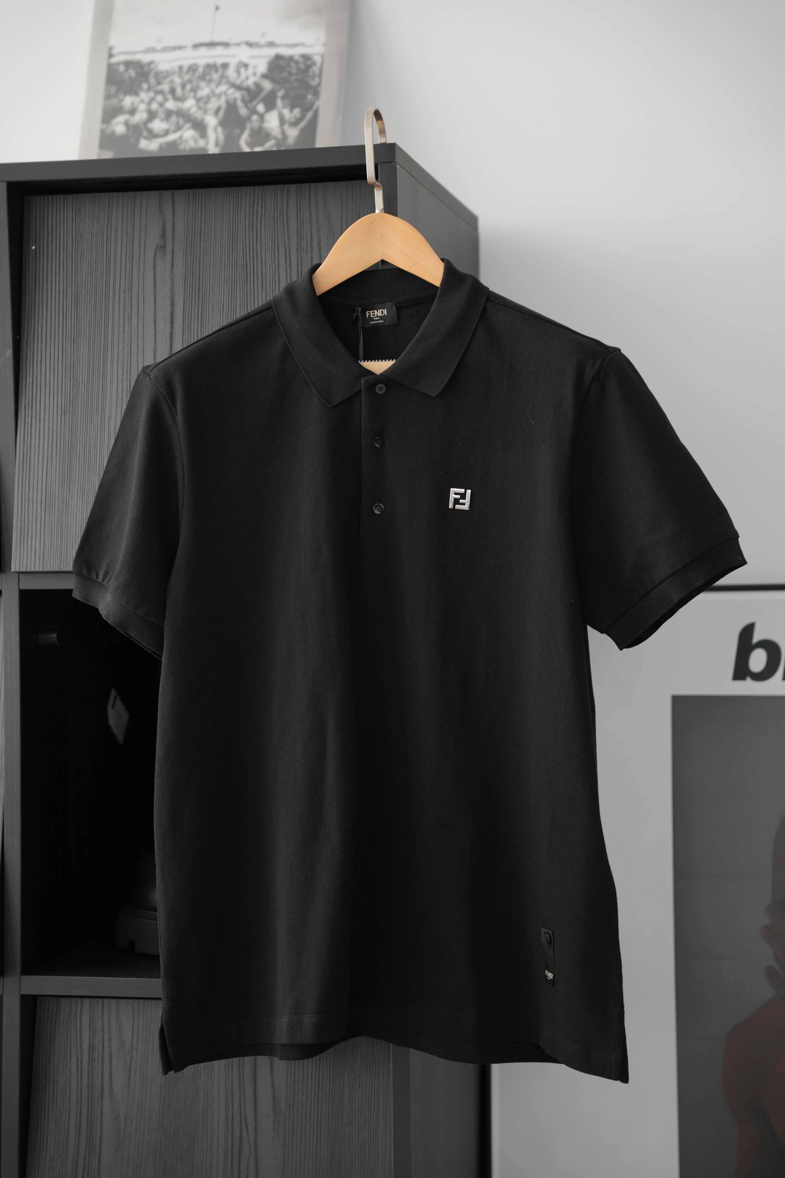 Item ID 8310 FEND1 Fendi -“ Frame craftsmanship ” Metal FF Buttoned embossed short