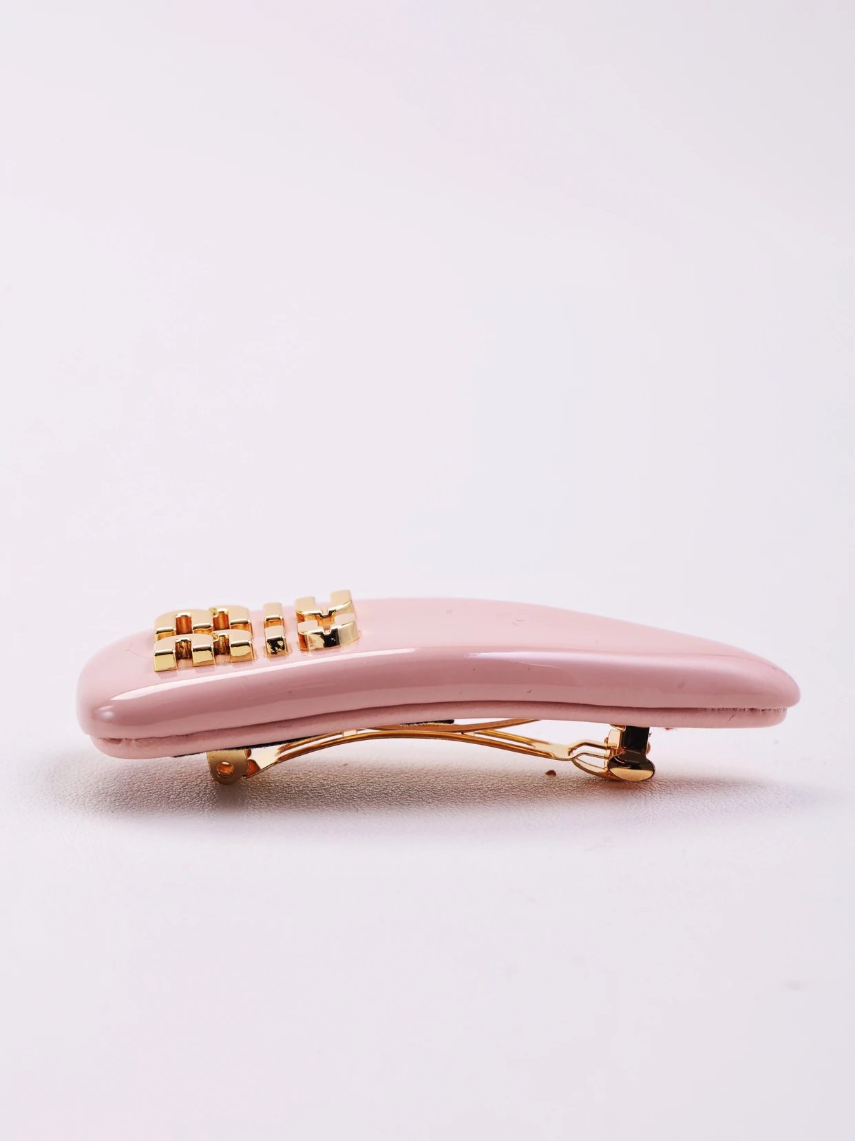 Item ID 8381 M1u-M1u- Miu Miu -2023FW- Pink patent leather hairpin - gold hardware