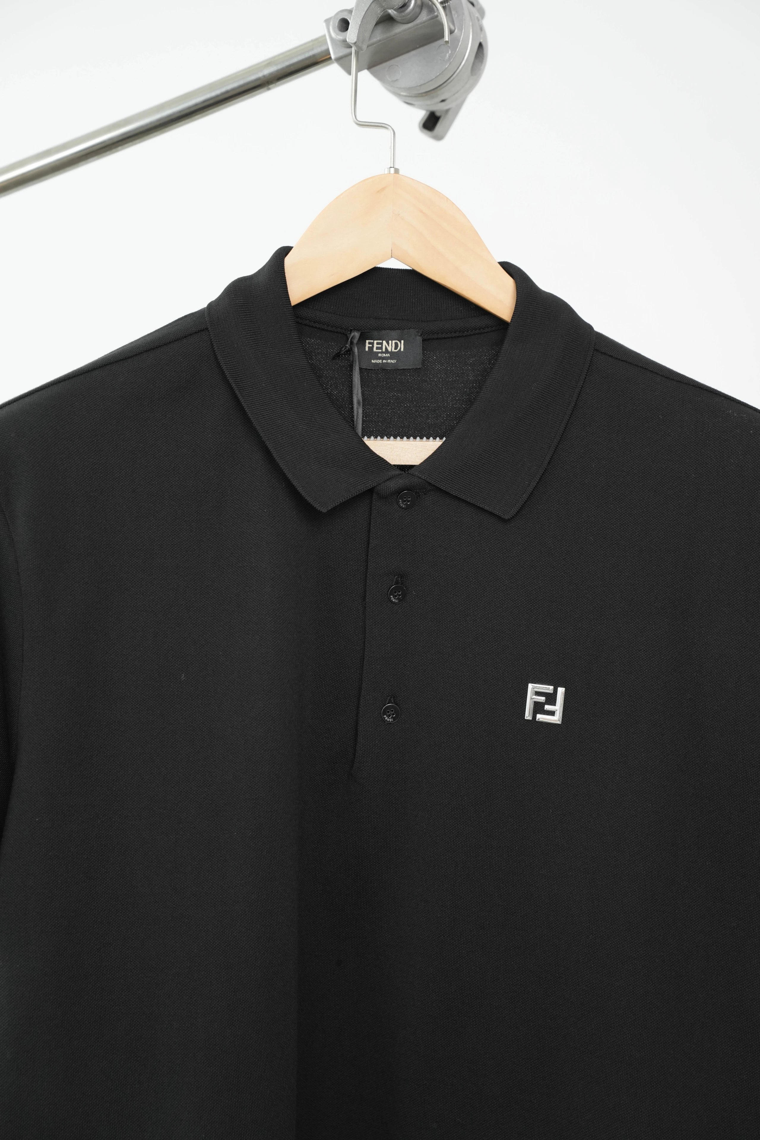 Item ID 8310 FEND1 Fendi -“ Frame craftsmanship ” Metal FF Buttoned embossed short