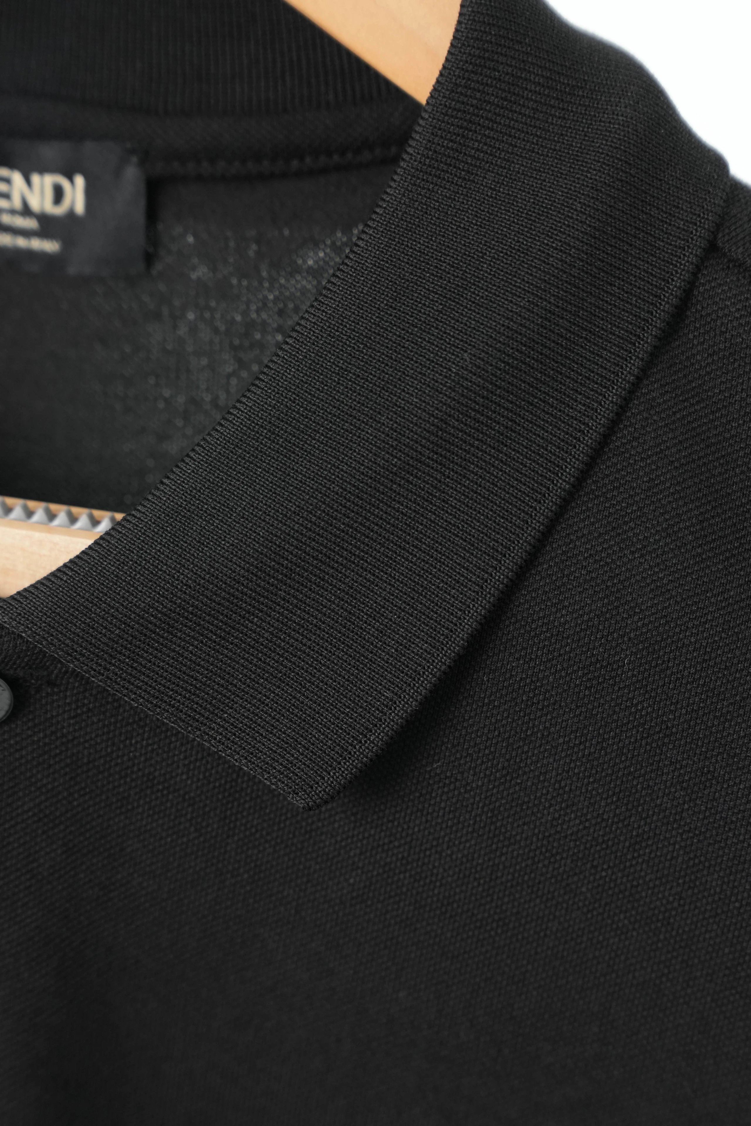 Item ID 8310 FEND1 Fendi -“ Frame craftsmanship ” Metal FF Buttoned embossed short