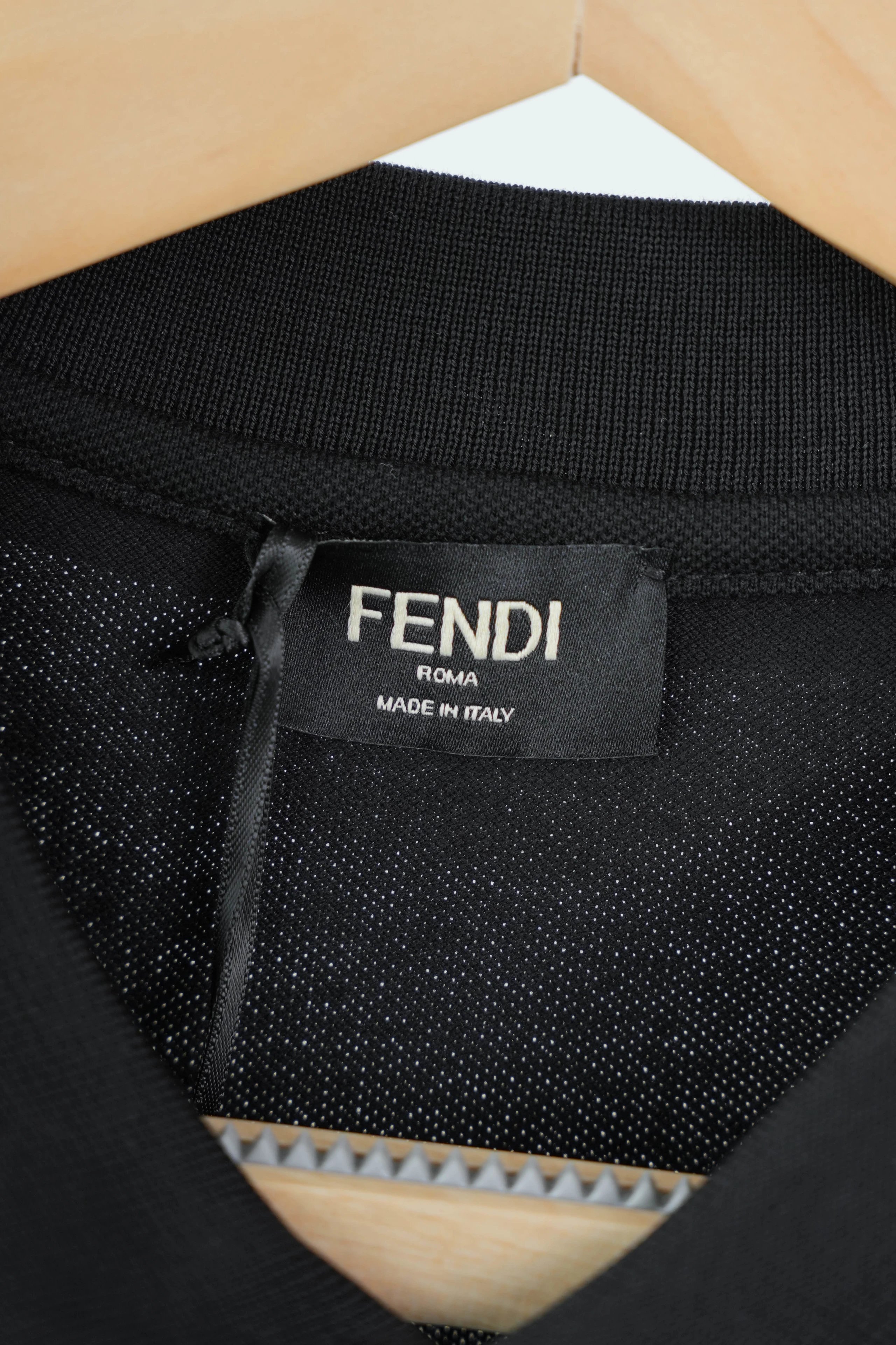 Item ID 8310 FEND1 Fendi -“ Frame craftsmanship ” Metal FF Buttoned embossed short