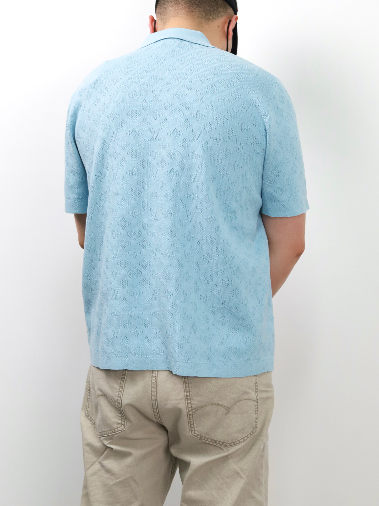 1V hollow-out pocket knitted polo