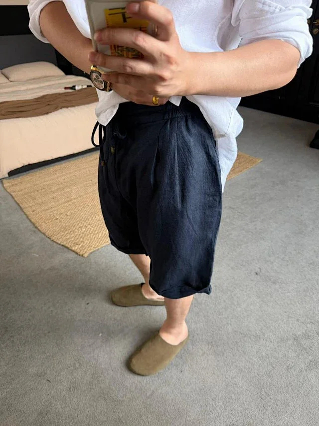 Item ID 9079 BC natural linen rolled edge shorts with double pleat design, drawstring, elastic waistband, and pleated casual shorts