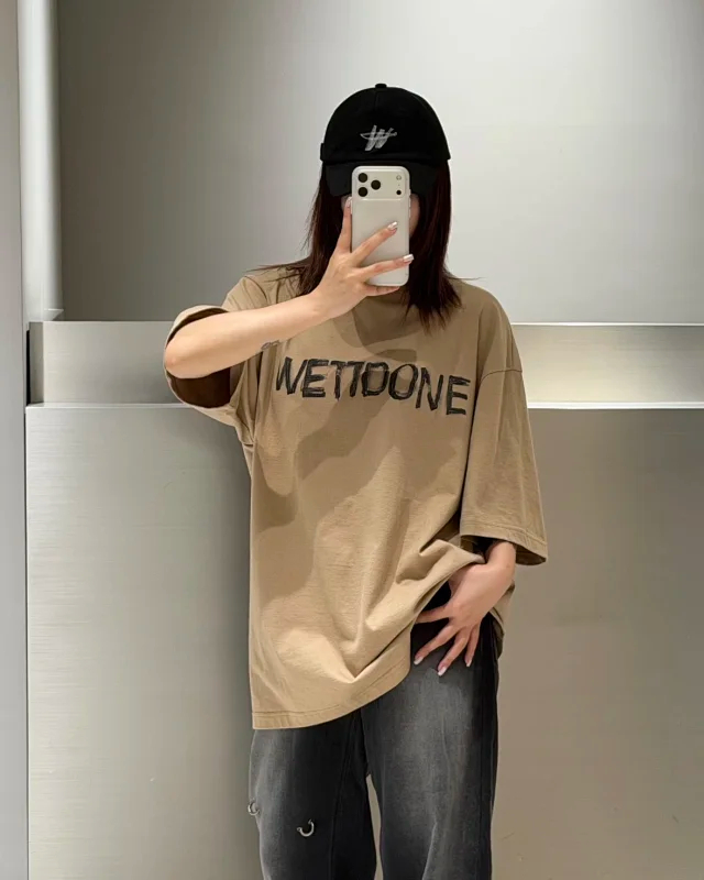 Item ID 9087 WE11DONE SS26 Imported Adhesive Material Fun Hand drawn Logo Soft Short sleeved T-shirt