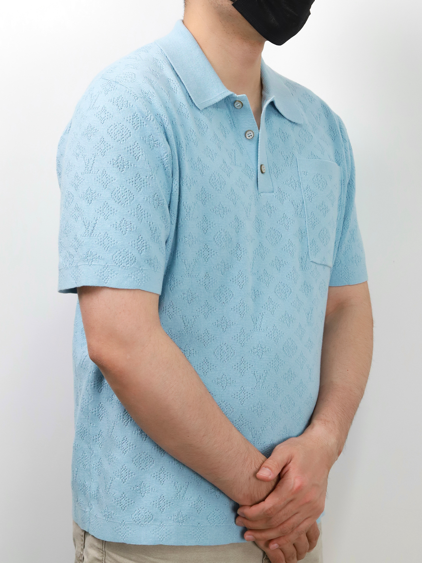 1V hollow-out pocket knitted polo