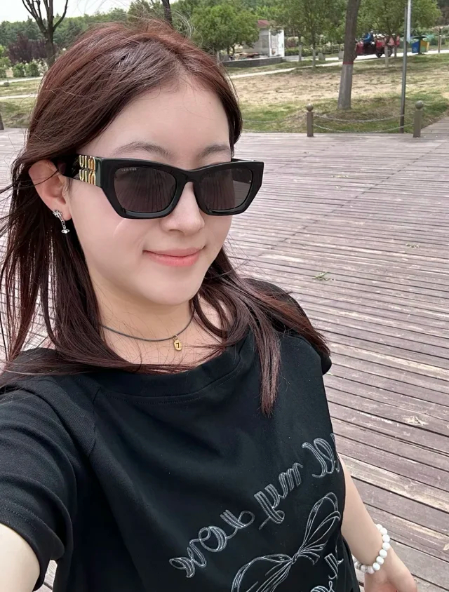 Item ID 9073 M1U Exclusive Hardware Accessory with letter carving, irregular shaped temple, black sunglasses, available in prescription