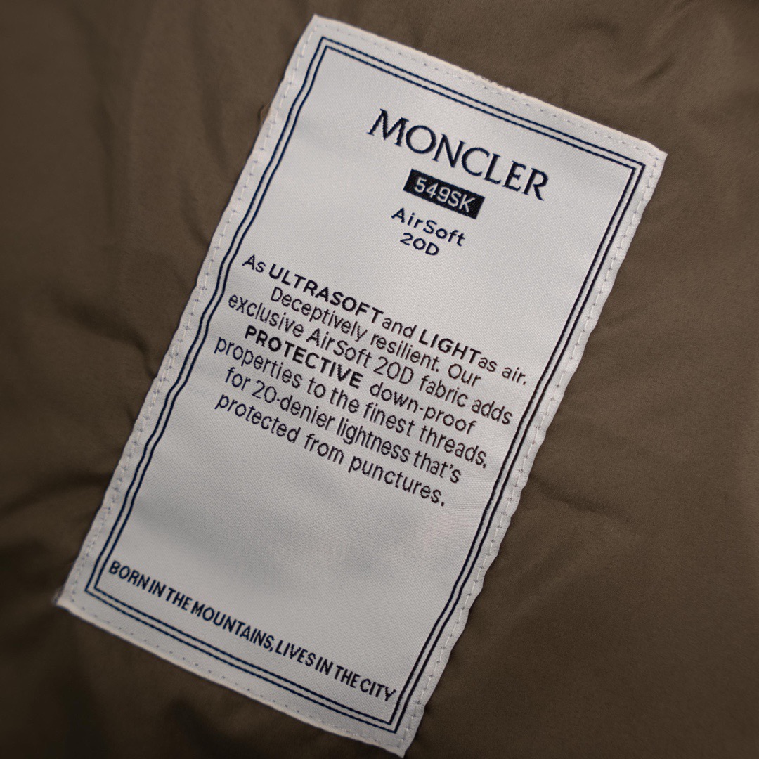 蒙口羽绒服_皮革标识拉链款