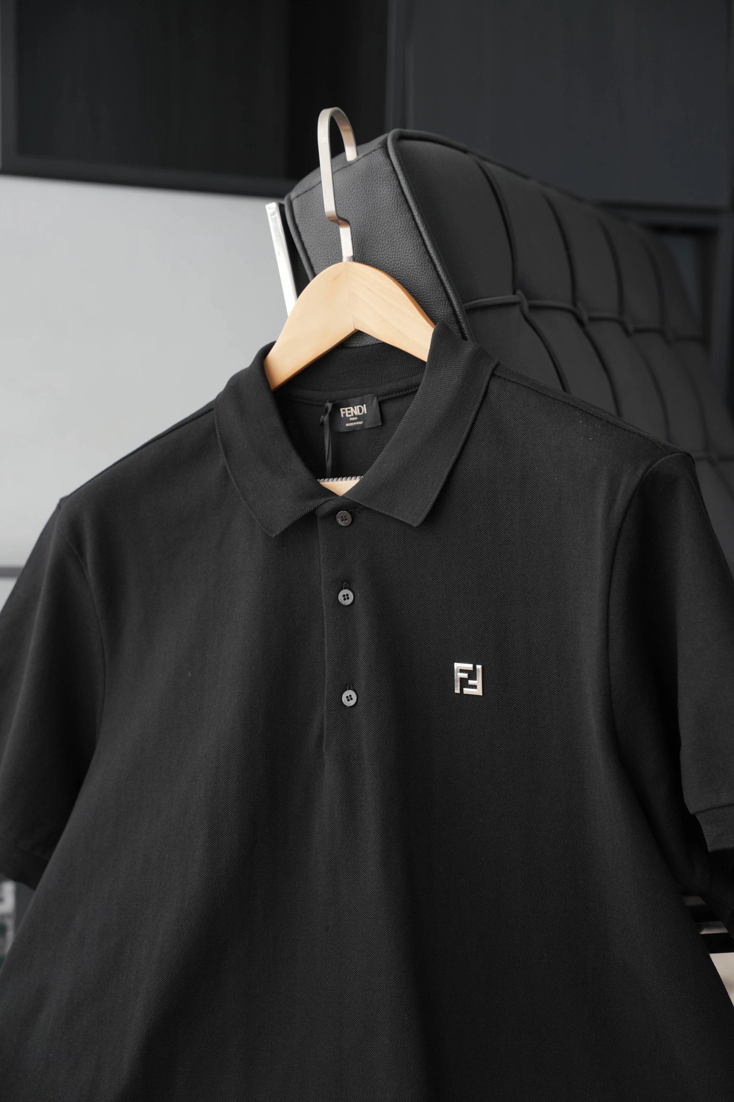 Item ID 8310 FEND1 Fendi -“ Frame craftsmanship ” Metal FF Buttoned embossed short