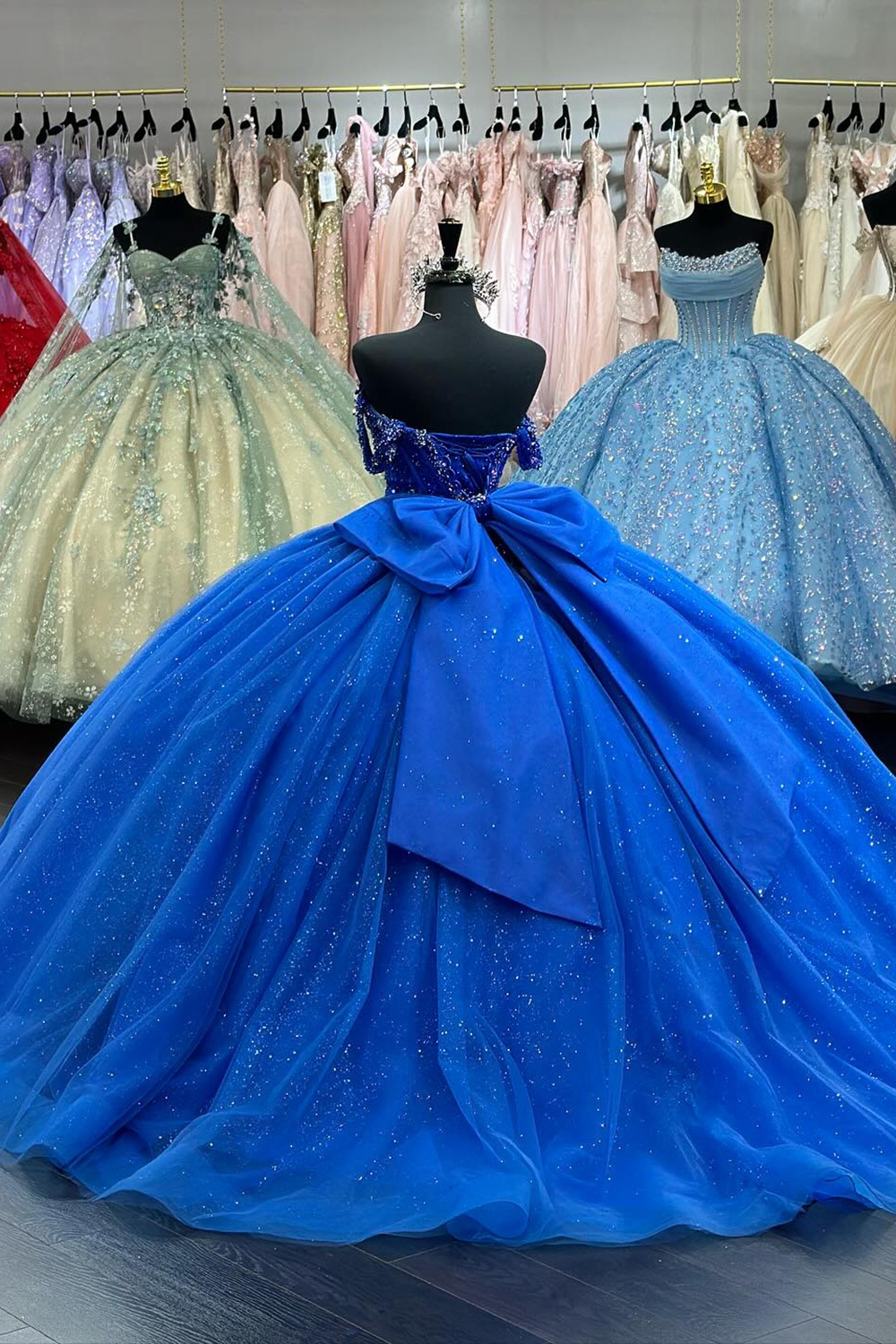 Sparkly Royal Blue Off the Shoulder Beaded Princess Tulle Quinceanera Dress with Bow
