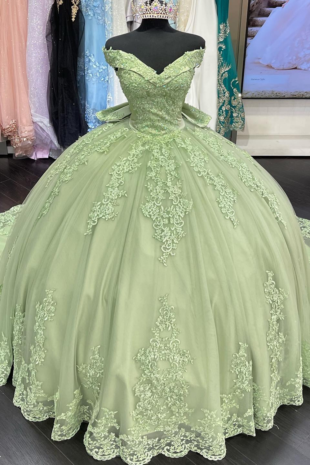 Green Off the Shoulder Applique Princess Tulle Quinceanera Dress with Bow