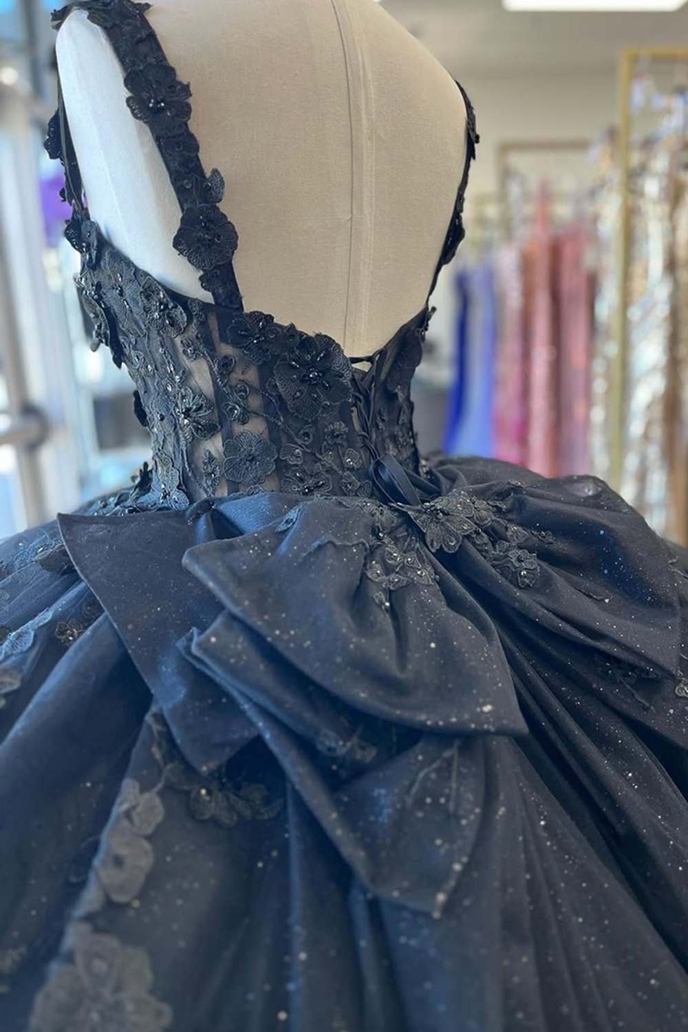 Sparkly Black Spaghetti Straps Beaded Corset Ball Gown Floral Appliques Quinceanera Dress with Bow