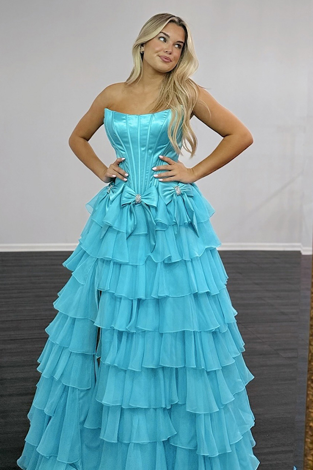 Fuchsia Strapless A-Line Ruffled Tiered Long Corset Prom Dress with Bows