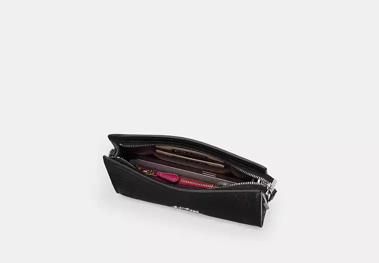 Slim Crossbody Bag In Signature Canvas With Floral Print