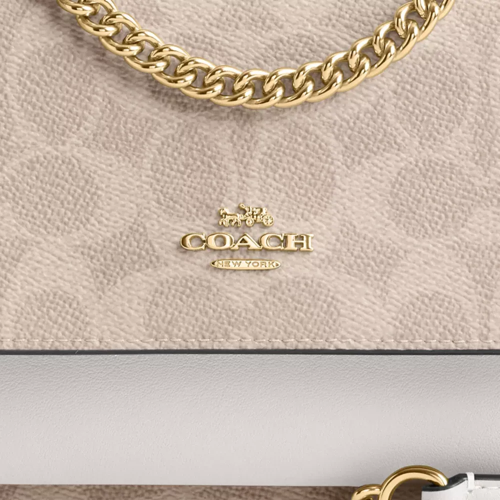 Mini Klare Crossbody Bag In Signature Canvas