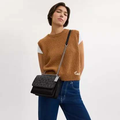 Klare Crossbody Bag With Signature Rivets