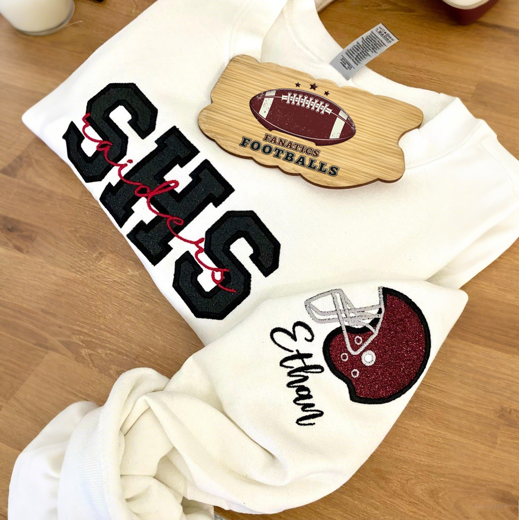 Custom Embroidered Football Sweatshirt With Child's Name And Helmet Printed On Sleeves