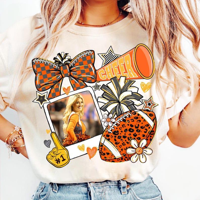 Customize The Vibrant Orange Campus Cheerleading Football Photo Sweatshirt To Capture Your Most Unforgettable Moments.
