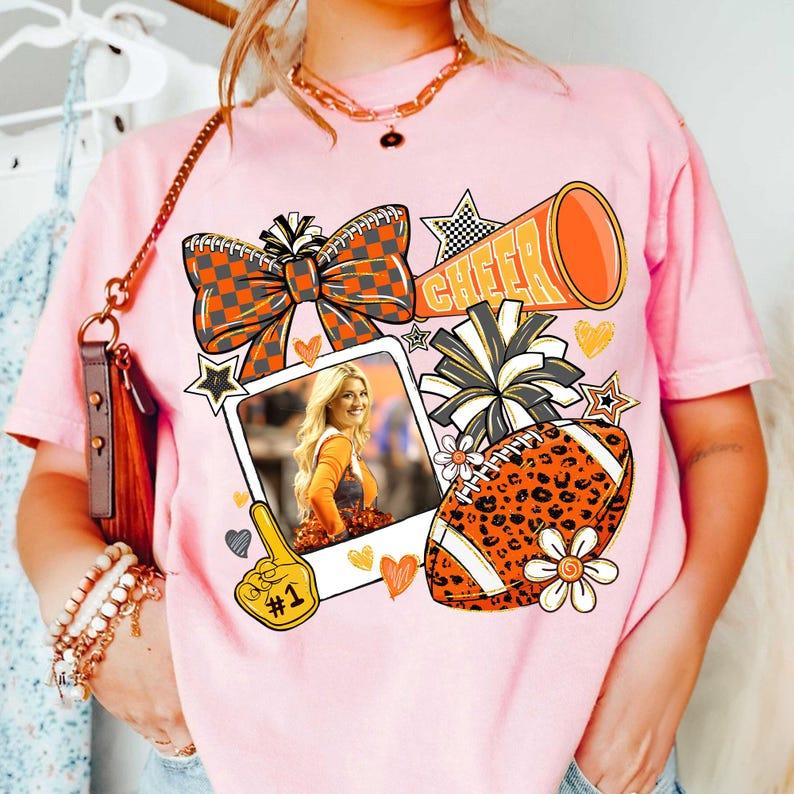 Customize The Vibrant Orange Campus Cheerleading Football Photo Sweatshirt To Capture Your Most Unforgettable Moments.