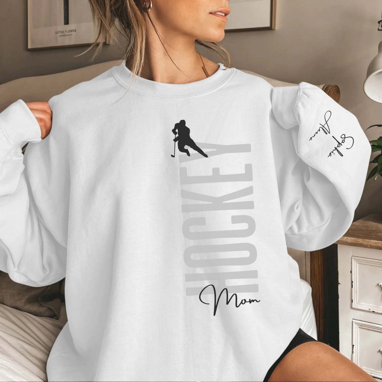 Personalized Hockey Sweatshirt With Softball Player's Name Printed On The Sleeve
