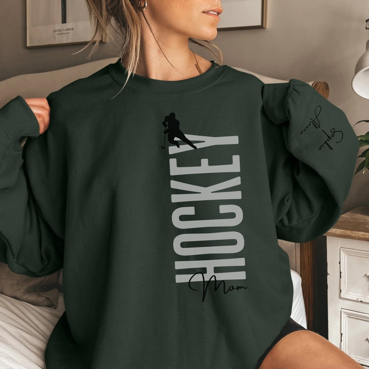 Personalized Hockey Sweatshirt With Softball Player's Name Printed On The Sleeve