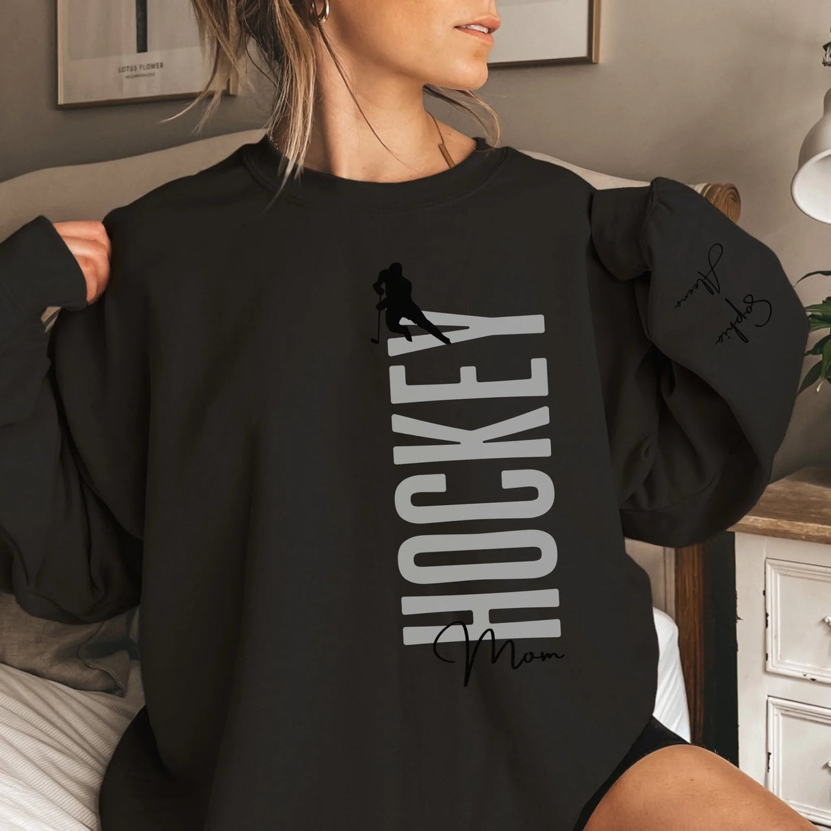 Personalized Hockey Sweatshirt With Softball Player's Name Printed On The Sleeve