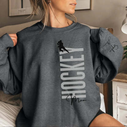 Personalized Hockey Sweatshirt With Softball Player's Name Printed On The Sleeve