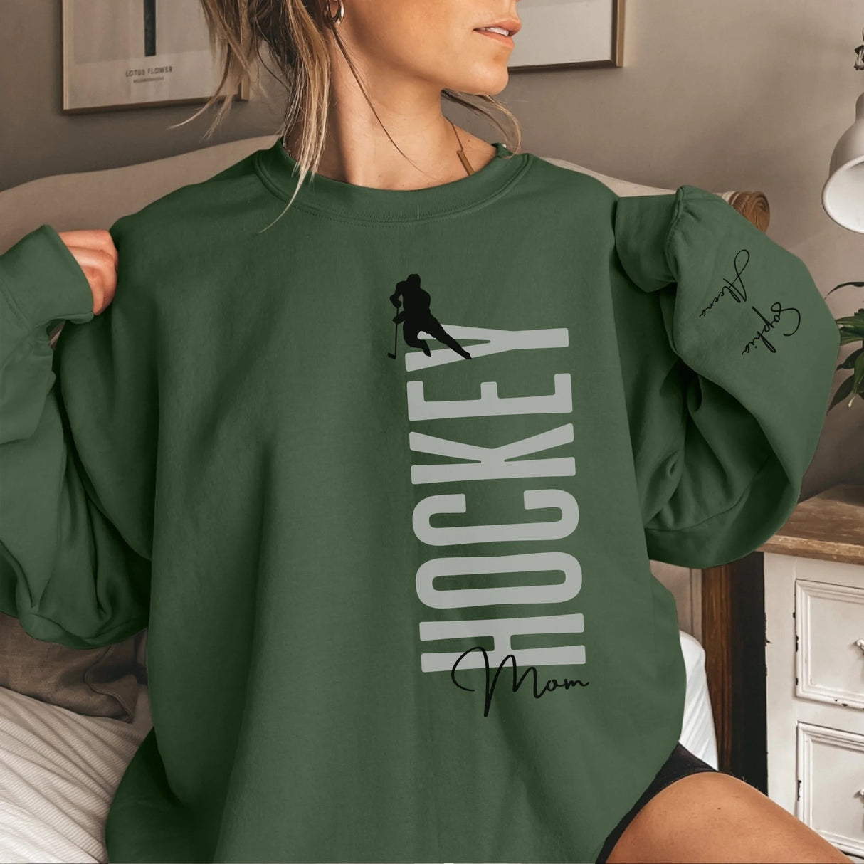 Personalized Hockey Sweatshirt With Softball Player's Name Printed On The Sleeve