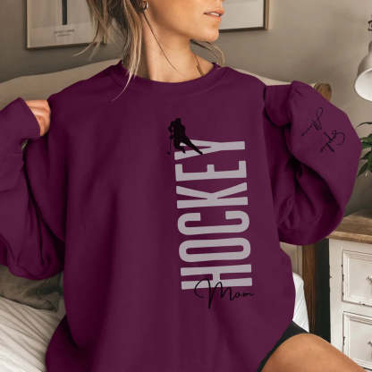 Personalized Hockey Sweatshirt With Softball Player's Name Printed On The Sleeve