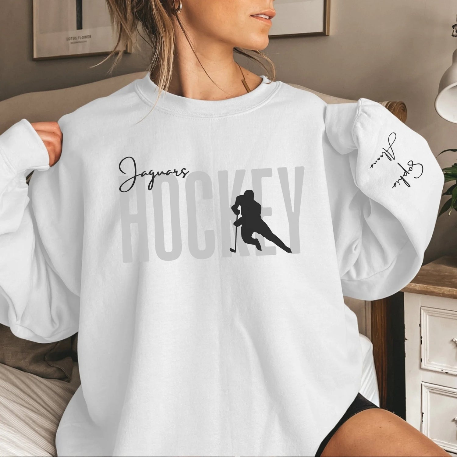 Personalized Hockey Sweatshirt With Softball Player's Name Printed On The Sleeve
