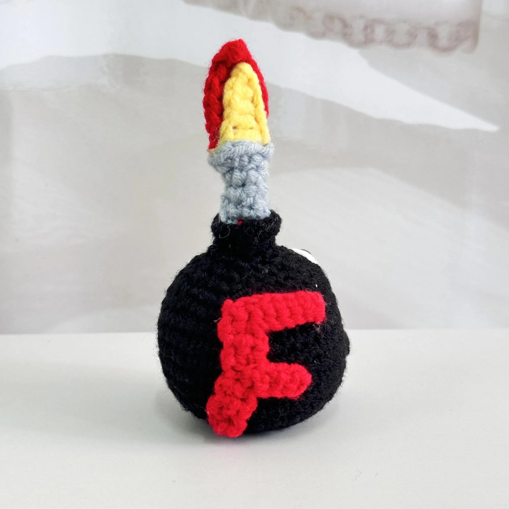 Handmade Crochet F-Bomb With Base