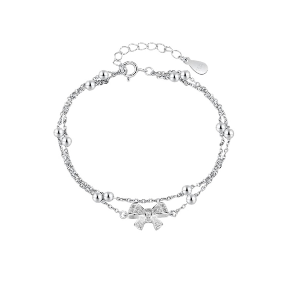 Bow - Accented Silver Bracelet | Double - Layered Whimsy for Your Wrist