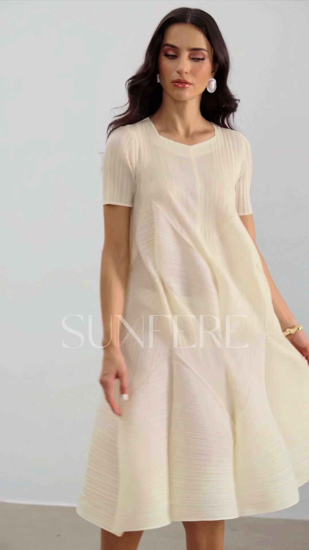 Kirstyn Short Sleeve Textured Midi Dress