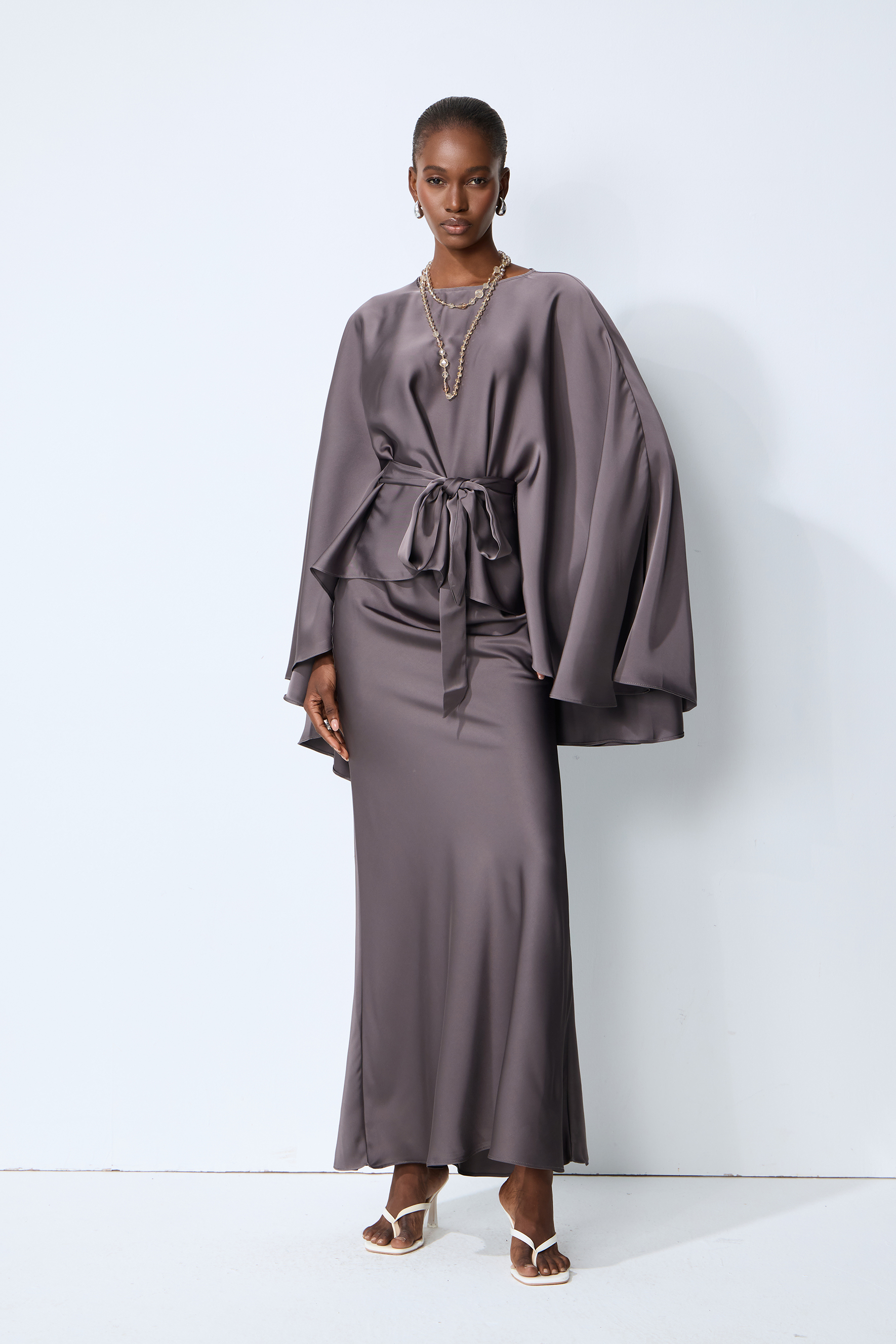 Exceptionally Graceful Grey Satin Cape Sleeve Top & Skirt Set