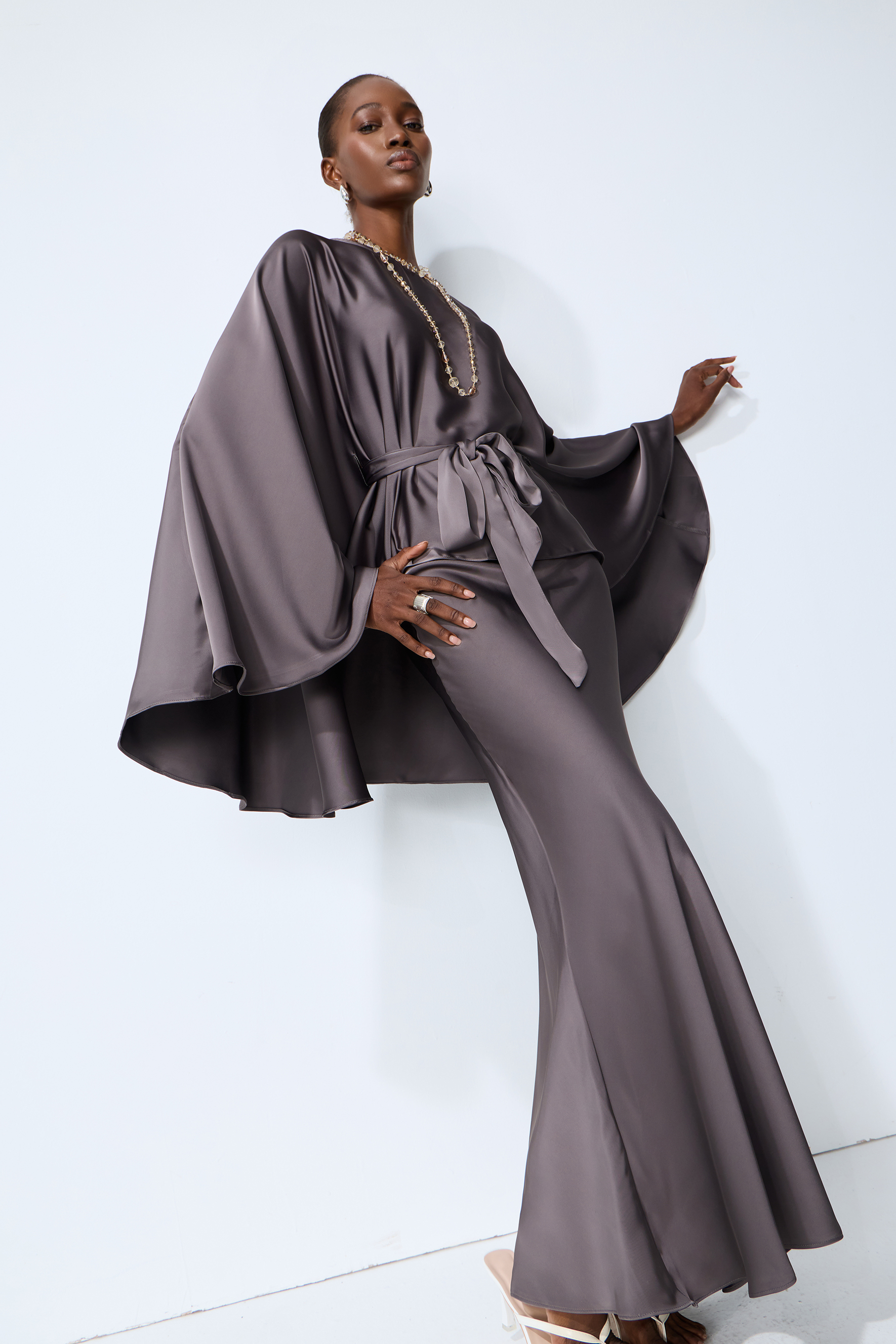 Exceptionally Graceful Grey Satin Cape Sleeve Top & Skirt Set