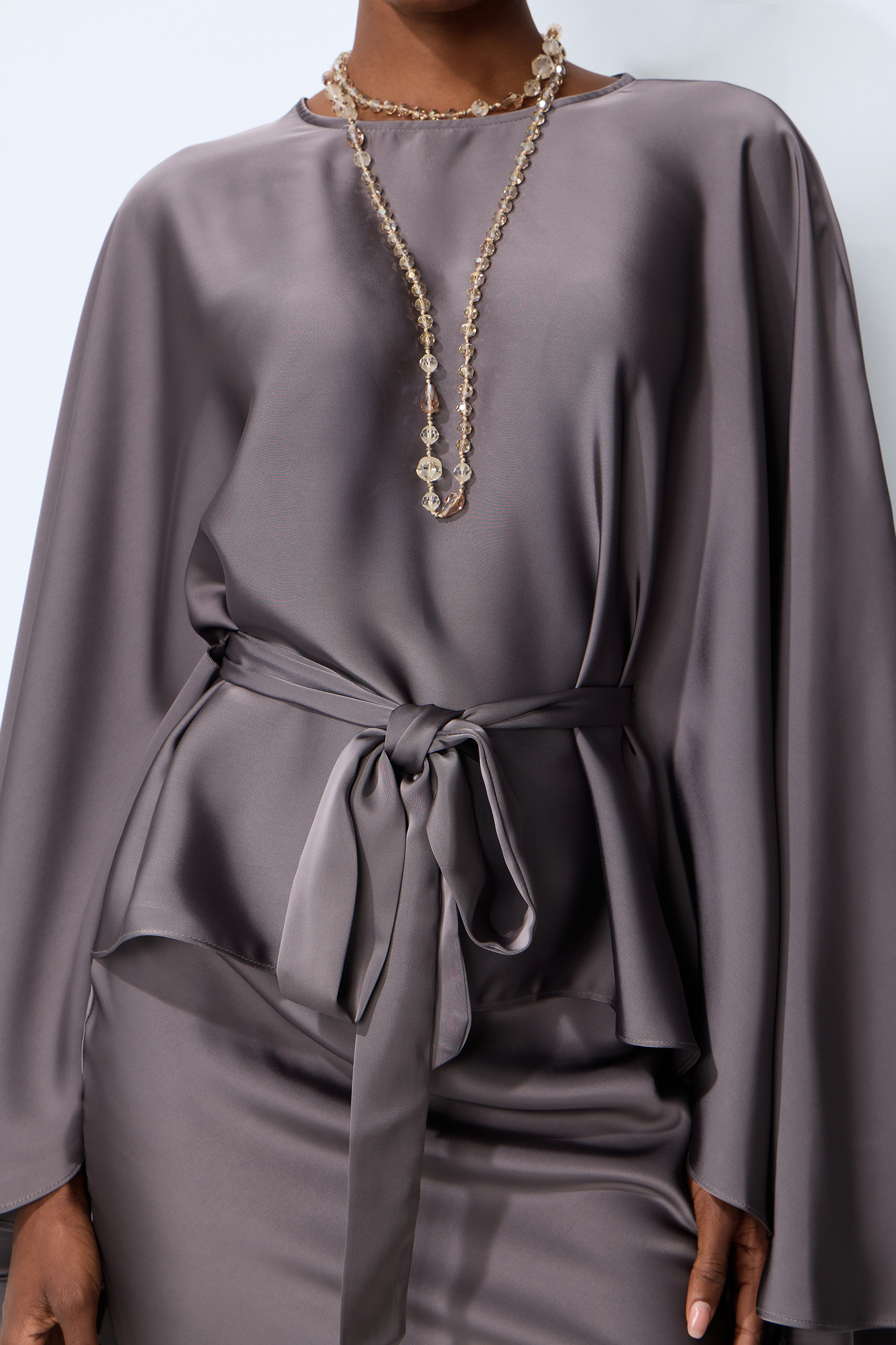 Exceptionally Graceful Grey Satin Cape Sleeve Top & Skirt Set